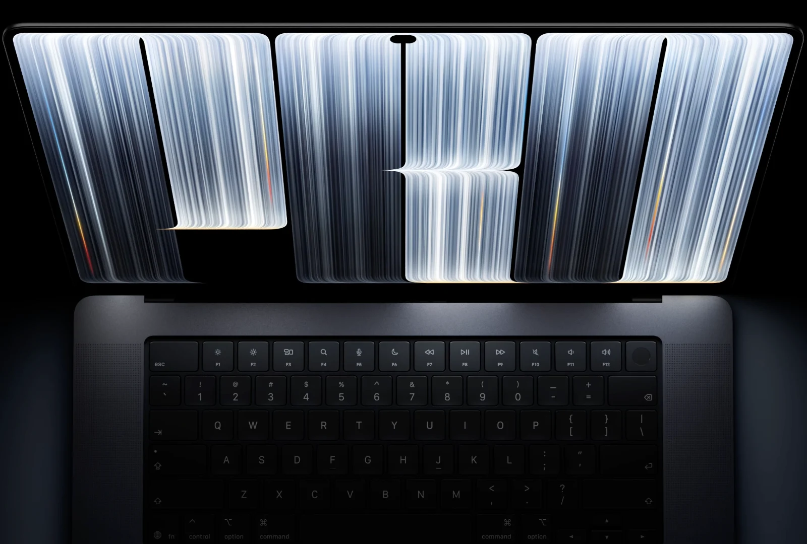 Apple MacBook Pro with PROLED XDR Display open on a desk